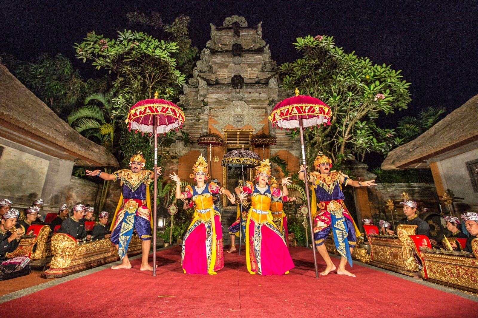 Traditional Balinese temple ceremony with worshippers